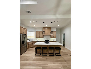 Welcome to this cozy 4-bedroom, 2-bathroom retreat nestled in - photo 6