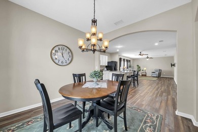 Located in Schooner Landing at Hammock Bay, this 3-bedroom - photo 2