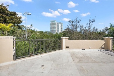 Cloisters on the Bay is a prestigious guard-gated bayfront