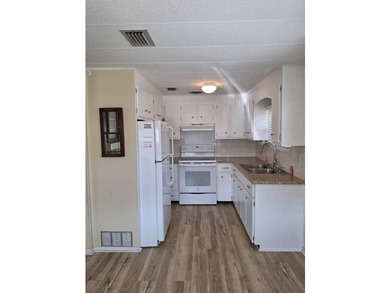 This immaculate home full of upgrades and renovations sits steps - photo 6