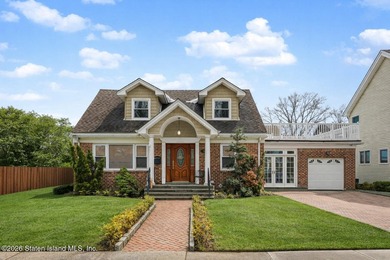 This beautifully updated home, expanded in 2007 to approximately - photo 2
