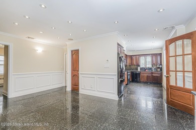 This beautifully updated home, expanded in 2007 to approximately - photo 3