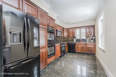 This beautifully updated home, expanded in 2007 to approximately - photo 4