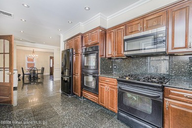 This beautifully updated home, expanded in 2007 to approximately - photo 6