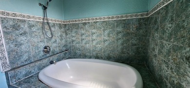This 4-bedroom, 2-bath home located on a small cul-de-sac offers - photo 18