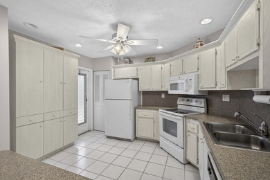 Welcome to your tranquil Florida retreat! This light-filled - photo 18