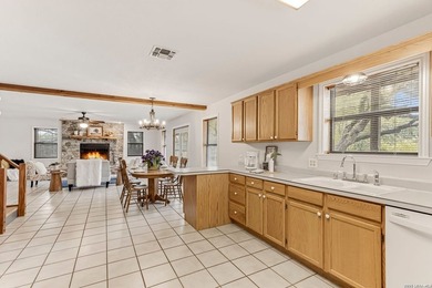 Nestled on over 6 private acres near Canyon Lake, this warm - photo 8