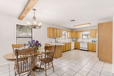 Nestled on over 6 private acres near Canyon Lake, this warm - photo 10