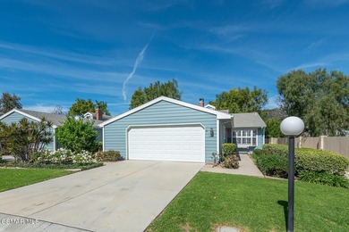 Highly desirable Cape Cod single story end unit! This charming