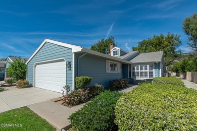 Highly desirable Cape Cod single story end unit! This charming