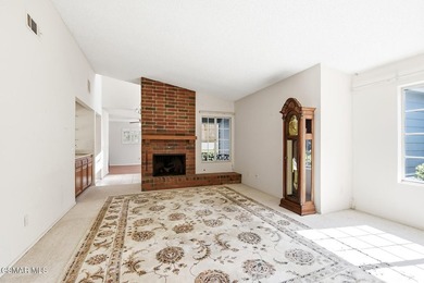 Highly desirable Cape Cod single story end unit! This charming