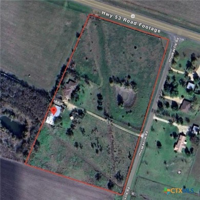 5,000 sq ft income-grade metal shop with HWY 53 frontage on