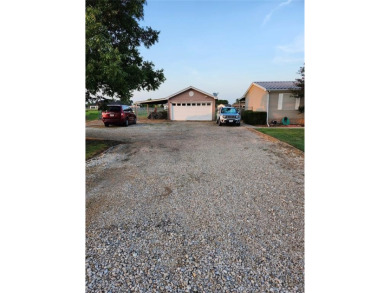 Doublewide on 1 acre of land, 2 car garage 1 covered parking