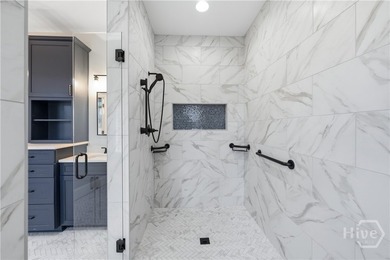 Perfectly positioned just over an acre in the prestigious