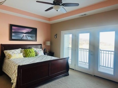 Enjoy a resort feel as you view Cherokee Lake from your living - photo 23