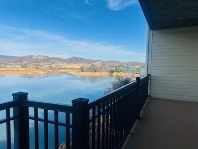Enjoy a resort feel as you view Cherokee Lake from your living - photo 40