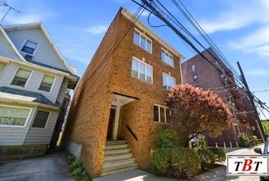 Welcome to 1555 East 13th Street! This colossal, impeccably - photo 1