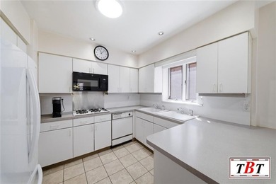 Welcome to 1555 East 13th Street! This colossal, impeccably - photo 7