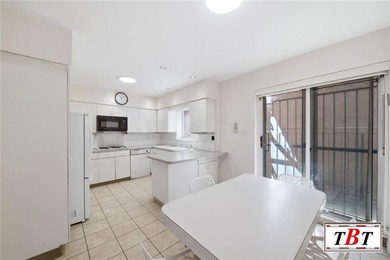 Welcome to 1555 East 13th Street! This colossal, impeccably - photo 9