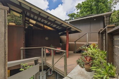 Nestled in lush Tantalus, above the Honolulu cityscape, this - photo 1