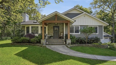Welcome to a truly exceptional Huntington retreat where timeless - photo 1