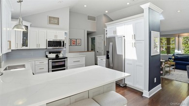 Welcome to a truly exceptional Huntington retreat where timeless - photo 9
