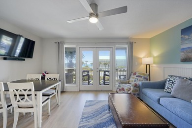 Grand Caribbean West Unit 202 is a beautifully remodeled - photo 1