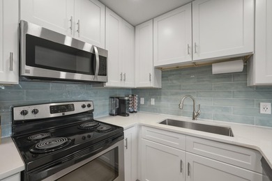 Grand Caribbean West Unit 202 is a beautifully remodeled - photo 8