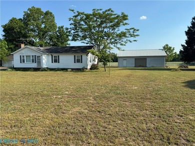 Looking for a home with an unfinished basement? Here is your - photo 2