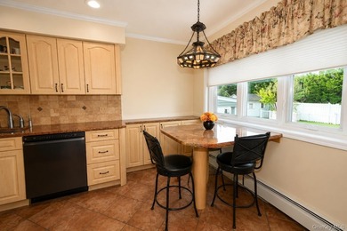 Opportunity awaits in this beautifully maintained multi level - photo 8