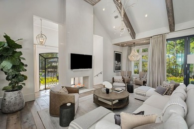 Tucked within the private, gated sanctuary of Four Mile Village - photo 2
