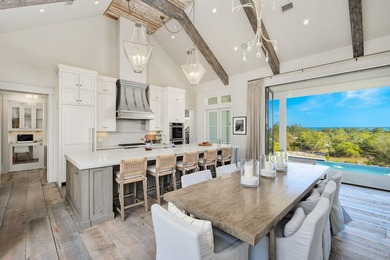Tucked within the private, gated sanctuary of Four Mile Village - photo 4