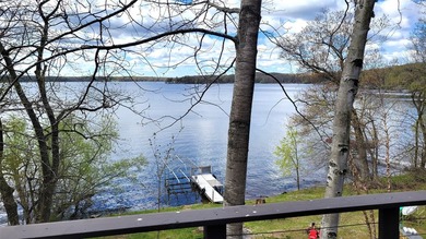 SO much to enjoy here! Level, sandy lakeshore, south facing - photo 3