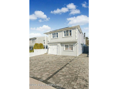 Welcome to 191 Suffolk Avenue, a warm and inviting two-family - photo 1