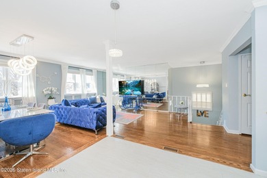 Welcome to 191 Suffolk Avenue, a warm and inviting two-family - photo 4