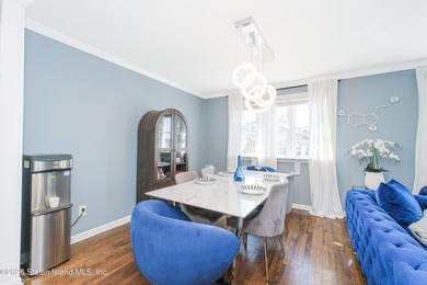 Welcome to 191 Suffolk Avenue, a warm and inviting two-family - photo 7