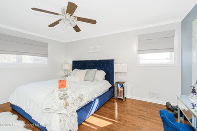 Welcome to 191 Suffolk Avenue, a warm and inviting two-family - photo 8