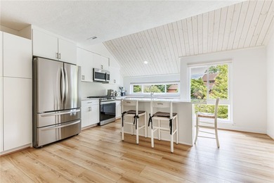 Wow! Incredible updates throughout! Tri-level living. Each of - photo 9