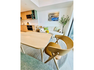 A beautifully furnished 1-bedroom residence featuring expansive