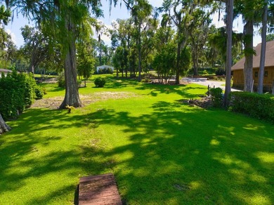 Discover a rare opportunity to own a prime waterfront lot on the - photo 12