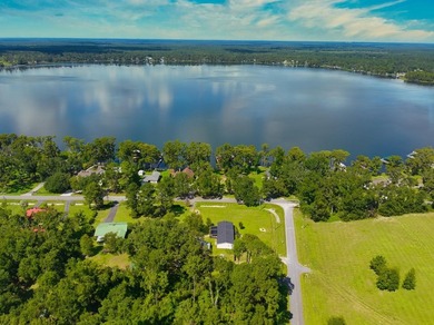 Discover a rare opportunity to own a prime waterfront lot on the - photo 20