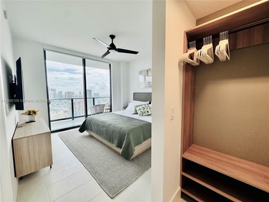 A beautifully furnished 1-bedroom residence featuring expansive