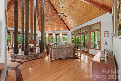Tucked away on over 4 private wooded acres in the desirable - photo 6