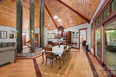 Tucked away on over 4 private wooded acres in the desirable - photo 9