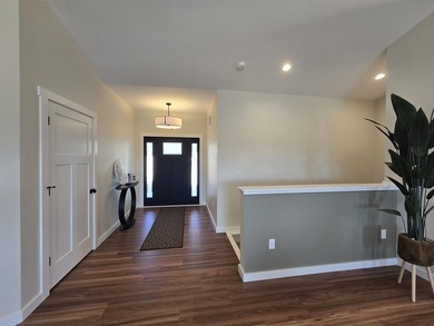 WATERFRONT HOME WITH DOCK AND A DEEDED SLIP IN THE EAST MARINA - photo 3
