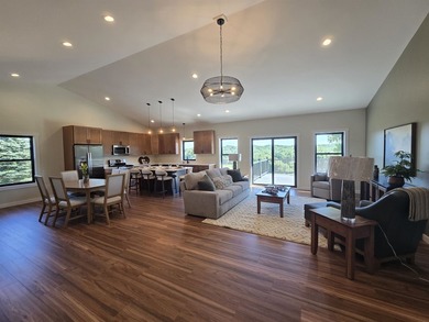 WATERFRONT HOME WITH DOCK AND A DEEDED SLIP IN THE EAST MARINA - photo 4