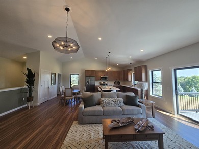 WATERFRONT HOME WITH DOCK AND A DEEDED SLIP IN THE EAST MARINA - photo 6