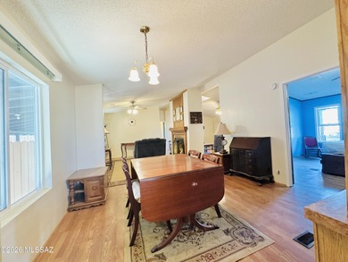 Step into this vibrant manufactured home just minutes from the