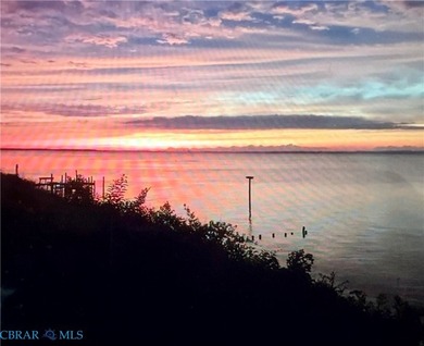 Rare opportunity to own a waterfront cottage overlooking the - photo 2