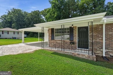 Beautifully renovated, 4 sided brick ranch on nearly 1/2 acre - photo 2